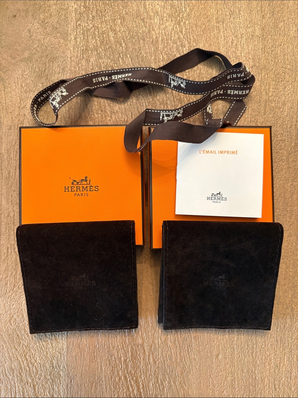 Set of two Hermes jewelry boxes with velvet pouches, card and ribbon